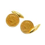 A pair of Victorian half gold sovereign cufflinks, dated 1896, in yellow metal frames, unmarked, 12.