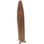 An airplane propeller, with wooden base, partially painted, 173cm high.