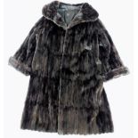 A mink full length coat, size unknown.