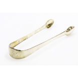 A pair of George III silver sugar tongs, of plain design with engraved H.C? monogram, London 1819, 1