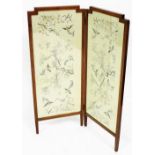 An Edwardian Sheraton revival mahogany framed two fold screen, each section set with Oriental silk p