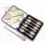 A collection of small silver, to include a set of six George V silver commemorative teaspoons, in a