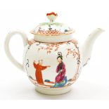 An 18thC first period Worcester porcelain teapot and cover, decorated with Oriental figures on a ter