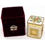 A Continental gilt coloured and metal lidded box, of rectangular form, the hinged lid raised with fl