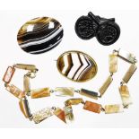 A group of stone set jewellery, to include a Victorian jet two fan brooch, 4cm wide, a brown agate s