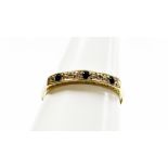 A 9ct gold sapphire and diamond half hoop eternity ring, the stones in platinum setting, on a yellow