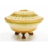 A Royal Worcester blush ivory porcelain pot pourri vase and cover, with a domed pierced lid and fleu