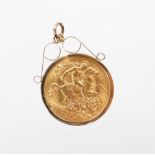 A George V half gold sovereign pendant, dated 1912, with a 9ct gold pendant mount, 4.8g.