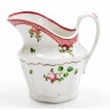 An early 19thC Newhall porcelain cream jug, with sprigs of flowers and pink scale border, pattern nu