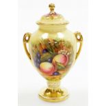 An Aynsley porcelain two handled jar and cover, of baluster form, decorated with fruit, etc. 21cm hi