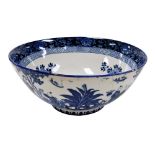 A Booths Silicon ware Ming bowl, in blue and white pattern with Oriental type design and Booth stamp