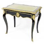 A 19thC James Winter & Son of Soho, London ebonised and ormolu mounted bureau plat in the French sty