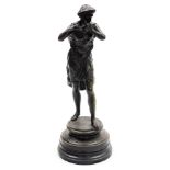 A 19thC spelter figure, of a man in classical dress playing a flute, on a hardwood base, 34cm high.