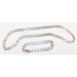 A silver necklace and bracelet set, comprising curb link neck chain, white metal stamped 925, 52cm l