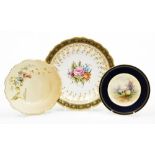 A collection of Royal Worcester porcelain cabinet plates, to include a plate decorated with sheep wi