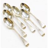 A set of six Victorian silver old English pattern dessert spoons, each with an engraved monogram, ma