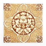 A late 19thC Arts & Crafts wall tile, in brown and sepia tones with conker and floral designs, 15cm