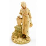 A Royal Worcester blush ivory porcelain figure of a lady, holding a water jug and leaning against a