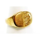 A 9ct gold gents signet ring, with half patterned oval ring head, hallmarks rubbed, 5.2g.