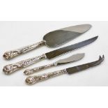 A collection of 20thC silver handled flatware, each with a stainless steel blade, comprising a cake