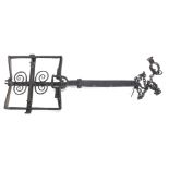 An antique wrought iron ornamental man trap, of rectangular form, with scroll decoration, 104cm wide