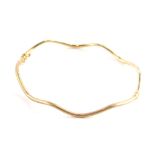 A 9ct gold hinged waved design bangle, thin loose design, 6.5cm diameter, 2.6g, boxed.