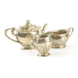An Edwardian silver Art Nouveau three piece bachelors tea service, by Elkington and Co. comprising t