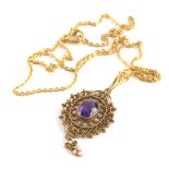 An amethyst and pearl pendant and chain, the filigree design pendant with oval amethyst and three le