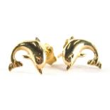 A pair of dolphin stud earrings, in yellow metal stamped 585, 0.9g all in, boxed.