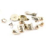 A group of silver and other jewellery, to include a pair of silver curved earrings, silver pendant,