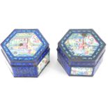 A pair of early 20thC Chinese cloisonne boxes and covers, each of hexagonal form, the lids profusely