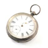 A late 19thC silver pocket watch, with white enamel dial with Roman numerals and seconds dial, lacki