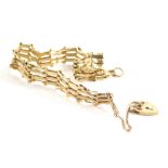 A 9ct gold gate bracelet, of three bar design with safety chain and love heart small padlock, 17cm l