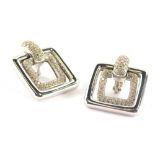 A pair of square link diamond set earrings, each with a central square and bar pavè setting with rou