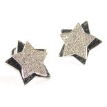 A pair of Wempe diamond and black diamond rotating star earrings, each pavè set with white diamonds