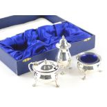 An Elizabeth II three piece cruet set, comprising open mustard pot, salt pepper pot, 9cm high, with