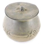 A late 19thC Tudric pewter lidded bowl, of bellied circular form raised with berries with removable