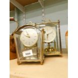 A Schatz 8 day mantel clock and another Kundo. (2)