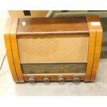 A vintage GEC walnut cased radio.