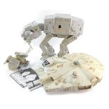 Star Wars figures, comprising a Scout Walker vehicle, Millennium Falcon AT-ST and an ATAT Imperial W