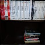 A group of Automobile Year and other Automobilia books, Rally Course annuals, etc. (1½ shelves)