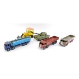 Dinky die cast, comprising a Foden tanker, two Foden flat bed trucks, a Dinky shovel dozer, and a Ch