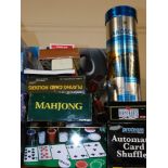 Various toys and games, Mahjong set, playing card holders, dominoes, automatic card shuffler, two pi