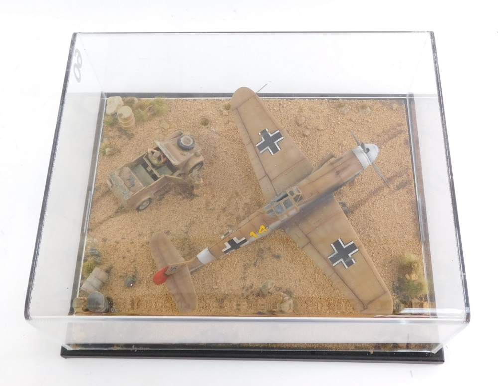 A diorama of a Messerschmitt, B1-1094H Trop3 Hans Joachin Marseille Africa September 1942, with figu