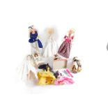 A group of dolls, two Barbies in evening dress, Eastern dolls, etc. (1 box)