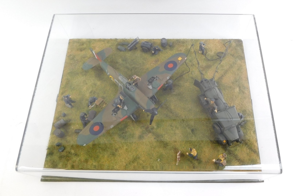 An diorama of a Mk1 Hawker Hurricane, 1:48 scale, Battle of Britain scene with figures, in a perspex