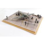 An RAF diorama of a Supermarine Spitfire MKV6, 1:48 scale, with figures in a perspex case.