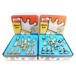 Two cased The Simpsons chess sets, each in a novelty tin. (2)