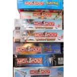 Seven themed Monopoly sets, comprising Pokemon., Coronation Street., Tropical Tycoon (x2)., Duel M