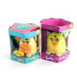 Two Furby babies, boxed.